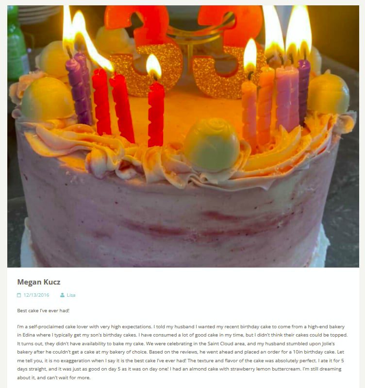 image of Jolie Olies dot com birthday cake with candles
