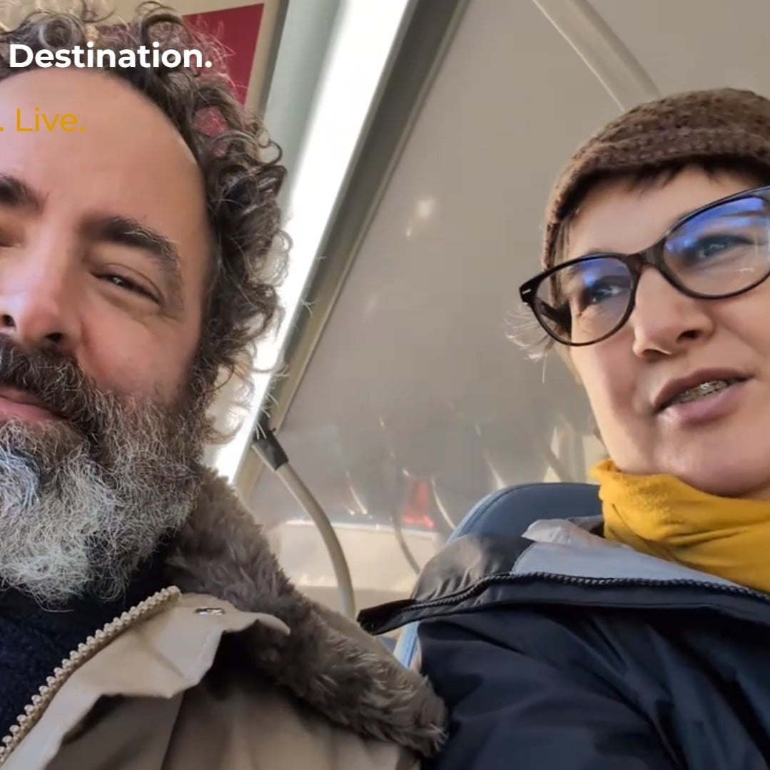 image of a man and a woman smiling